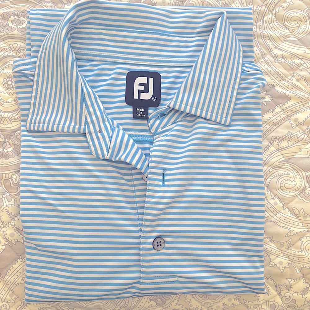 FootJoy, size large, men’s golf shirt.  Size is L but would also fit XL.